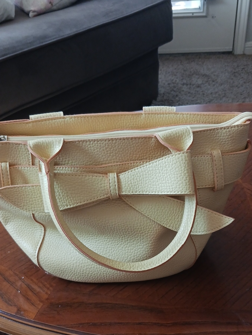 Yellow Pebbled Purse with Decorative Bow Accent